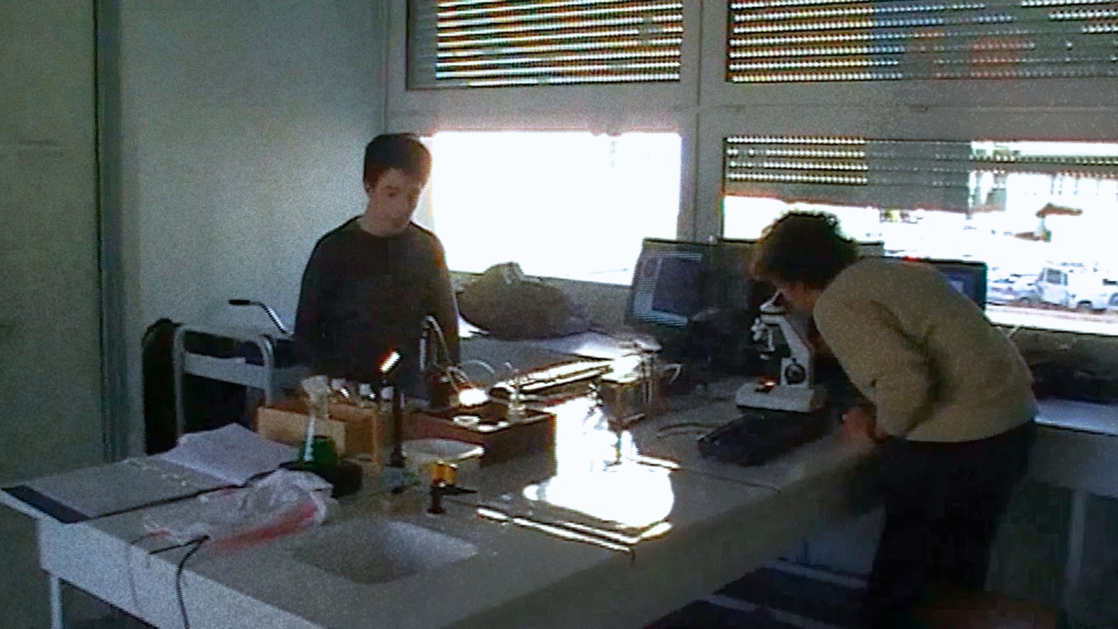 Adam and Remy as teenagers in their high-school science club
